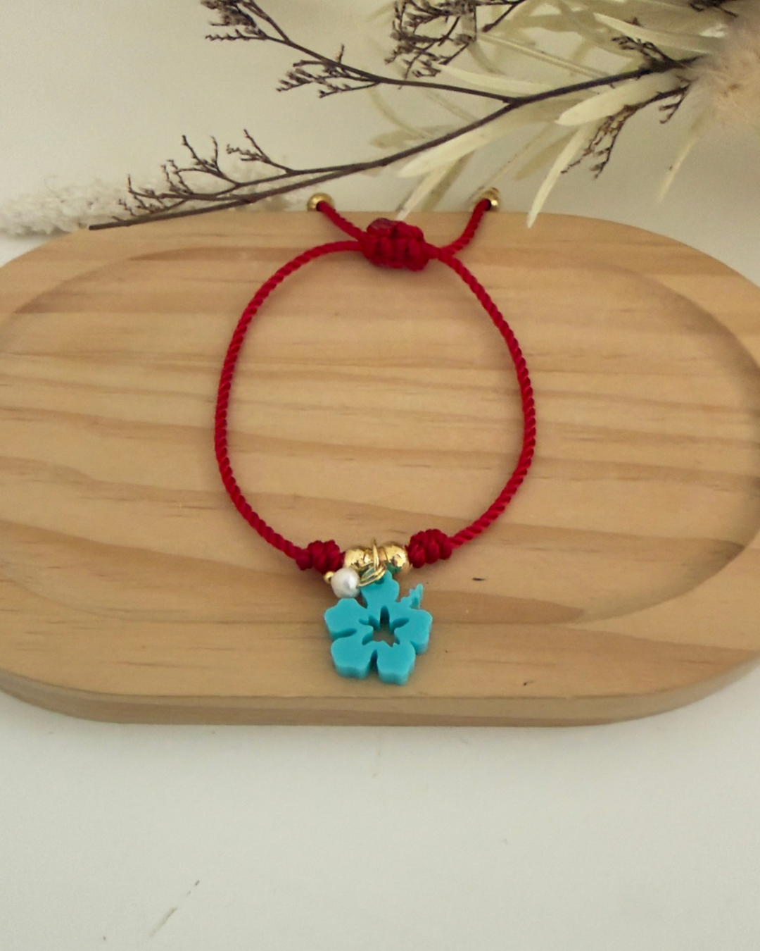 Pulsera amapola hilo rojo
